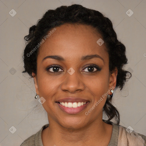 Joyful black young-adult female with medium  black hair and brown eyes