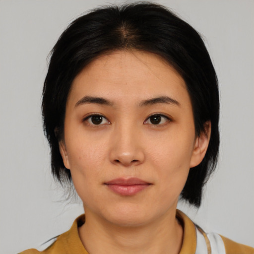Neutral asian young-adult female with medium  black hair and brown eyes