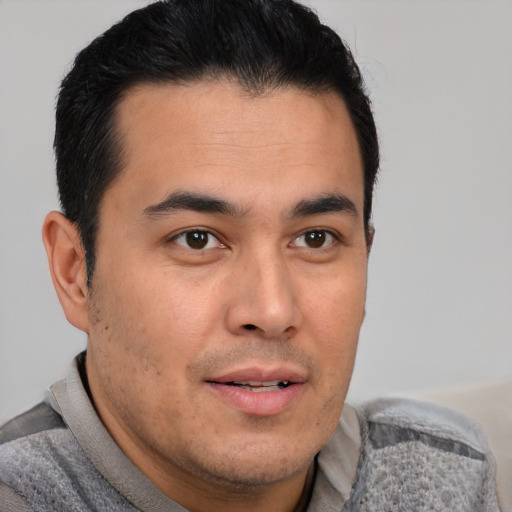 Neutral latino young-adult male with short  brown hair and brown eyes