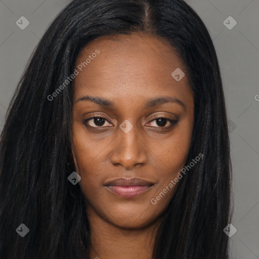 Joyful black young-adult female with long  brown hair and brown eyes