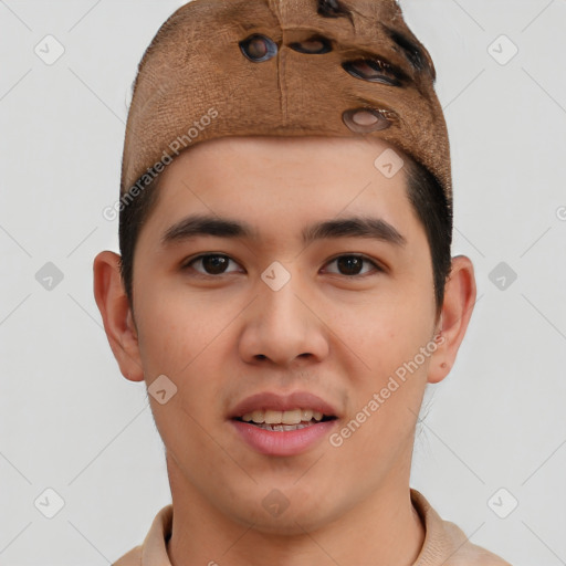 Joyful asian young-adult male with short  brown hair and brown eyes