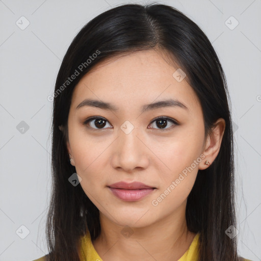 Joyful latino young-adult female with long  brown hair and brown eyes