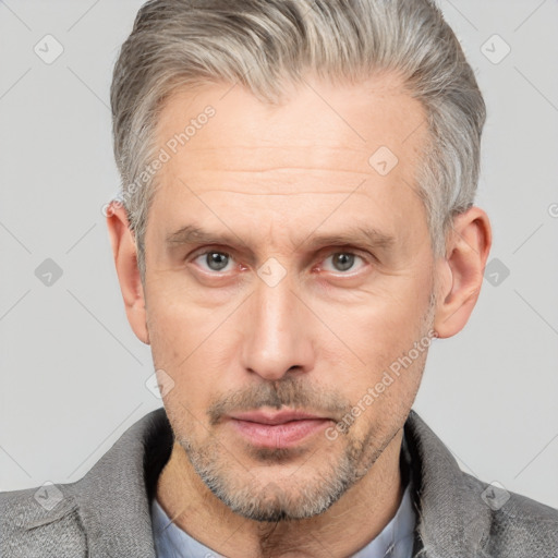 Neutral white adult male with short  brown hair and brown eyes