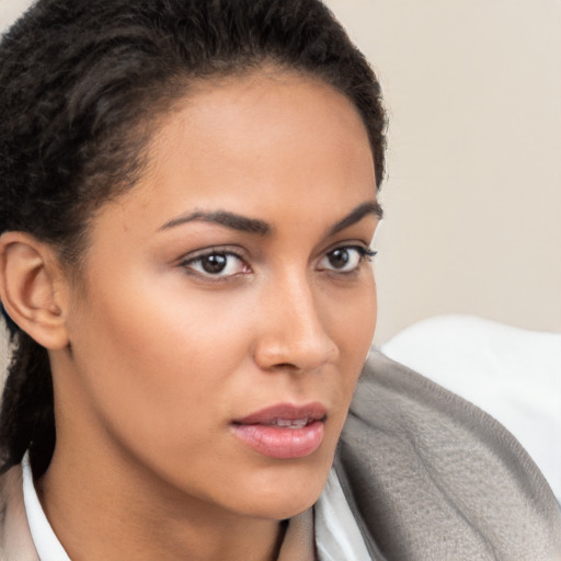 Neutral white young-adult female with short  brown hair and brown eyes