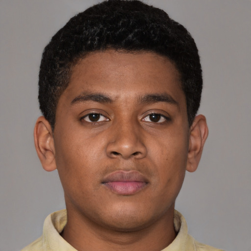 Neutral latino young-adult male with short  brown hair and brown eyes