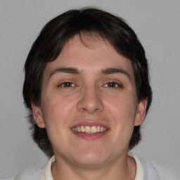 Joyful white young-adult male with medium  brown hair and brown eyes