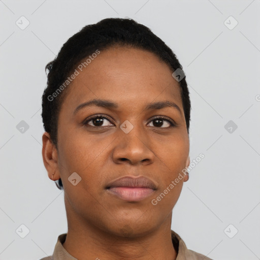 Joyful black young-adult female with short  black hair and brown eyes