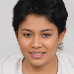 Joyful asian young-adult female with short  brown hair and brown eyes