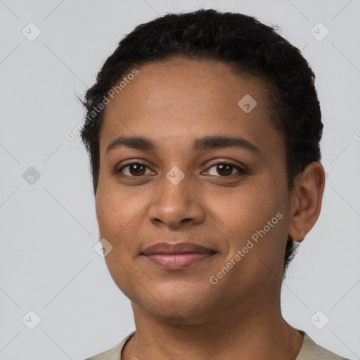 Joyful latino young-adult female with short  brown hair and brown eyes