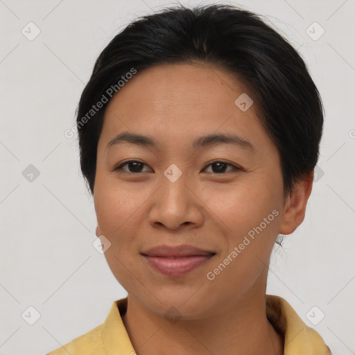 Joyful asian young-adult female with short  brown hair and brown eyes