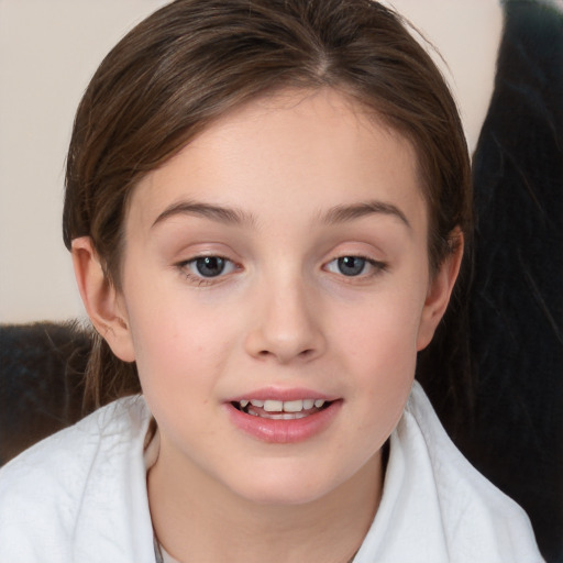 Joyful white child female with medium  brown hair and brown eyes