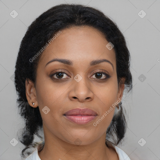 Joyful black young-adult female with medium  brown hair and brown eyes