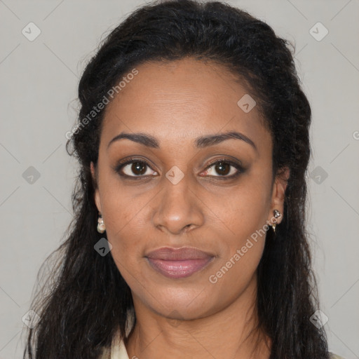 Joyful black young-adult female with long  black hair and brown eyes