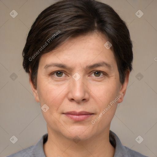 Joyful white adult female with short  brown hair and brown eyes