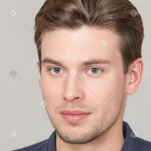 Neutral white young-adult male with short  brown hair and grey eyes