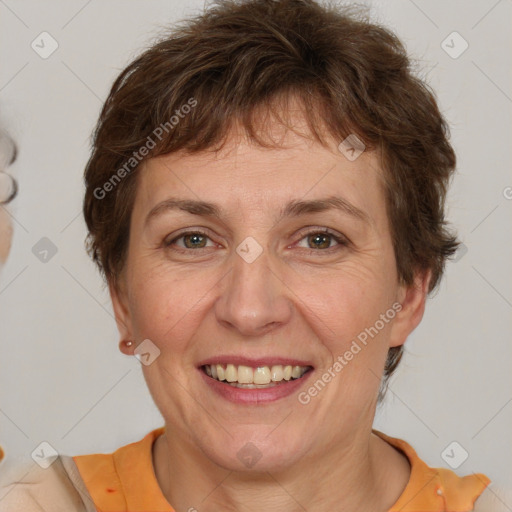 Joyful white adult female with short  brown hair and brown eyes