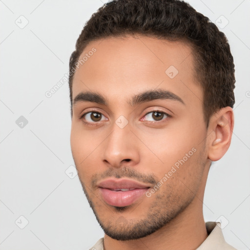 Neutral white young-adult male with short  brown hair and brown eyes