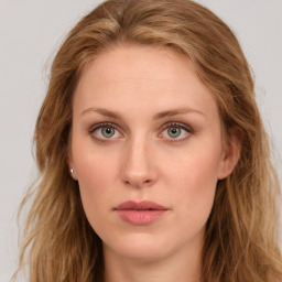 Neutral white young-adult female with long  brown hair and green eyes