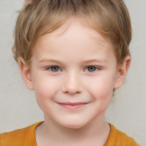 Joyful white child female with short  brown hair and brown eyes