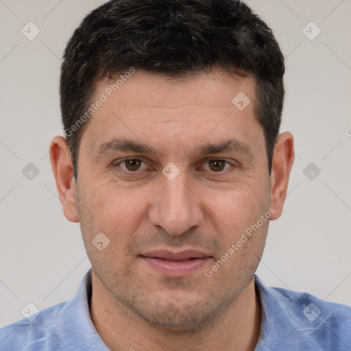 Joyful white adult male with short  brown hair and brown eyes