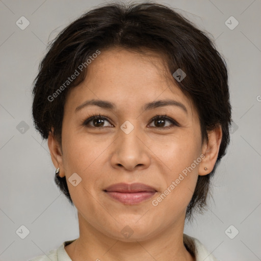 Joyful white adult female with medium  brown hair and brown eyes