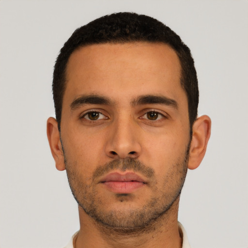 Neutral latino young-adult male with short  black hair and brown eyes