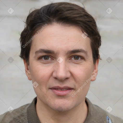 Joyful white adult male with short  brown hair and grey eyes