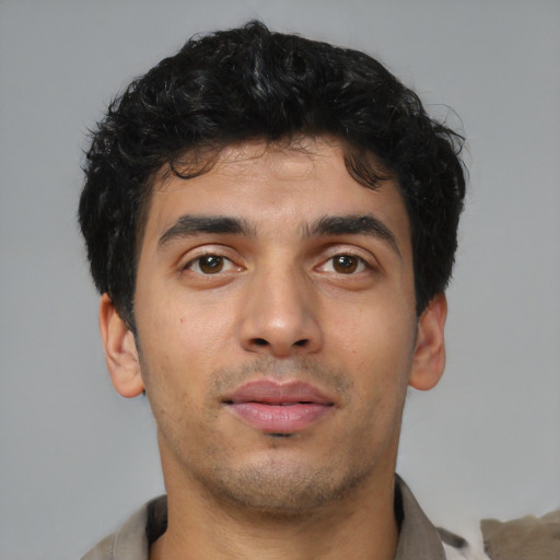 Neutral latino young-adult male with short  brown hair and brown eyes