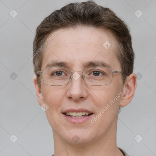 Joyful white adult male with short  brown hair and grey eyes