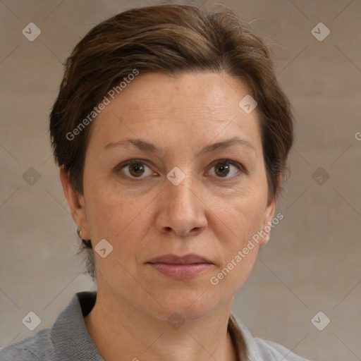 Joyful white adult female with short  brown hair and brown eyes