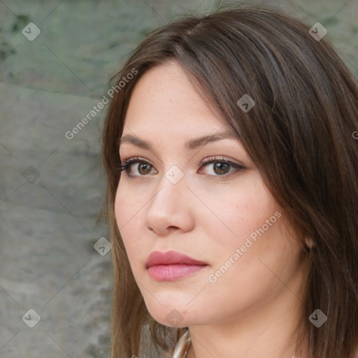 Neutral white young-adult female with long  brown hair and brown eyes