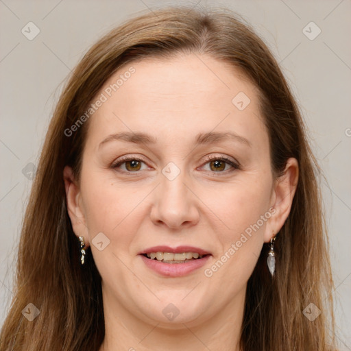 Joyful white adult female with long  brown hair and brown eyes