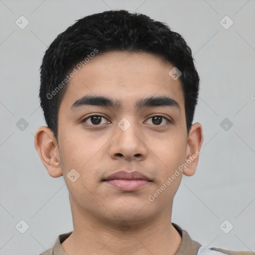 Neutral latino young-adult male with short  black hair and brown eyes