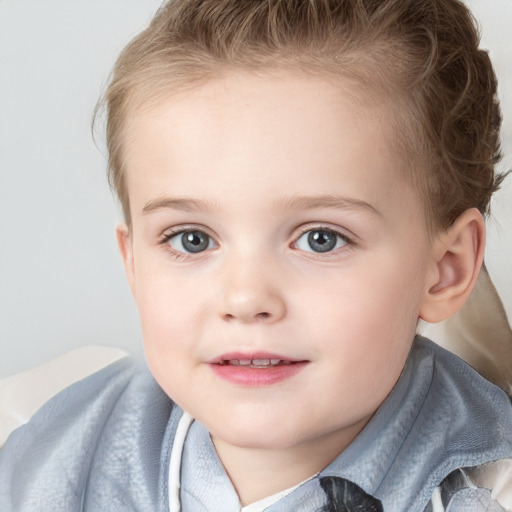 Joyful white child female with short  brown hair and blue eyes