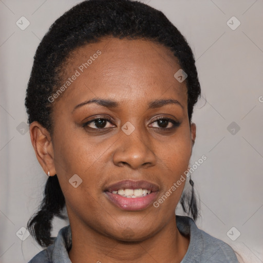 Joyful latino young-adult female with short  black hair and brown eyes