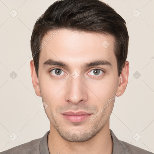 Neutral white young-adult male with short  brown hair and brown eyes