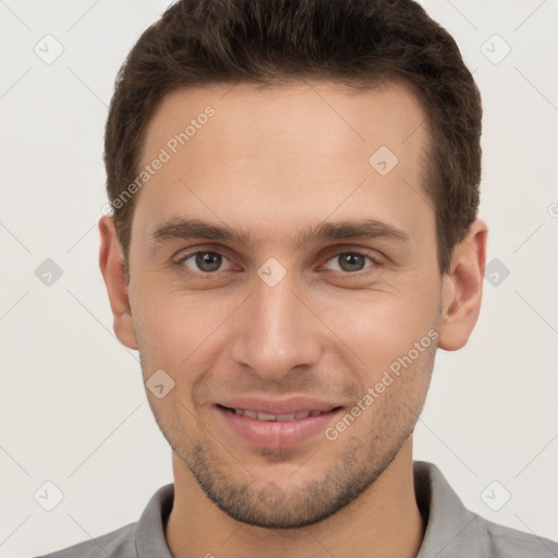 Joyful white young-adult male with short  brown hair and brown eyes