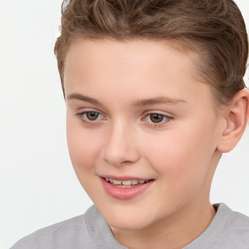 Joyful white child female with short  brown hair and brown eyes