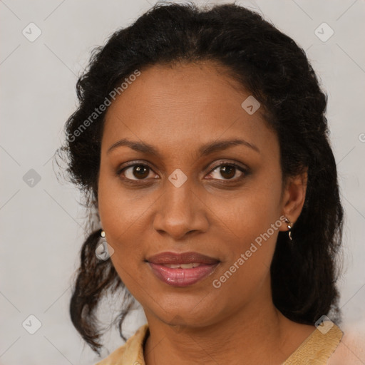 Joyful black adult female with short  brown hair and brown eyes