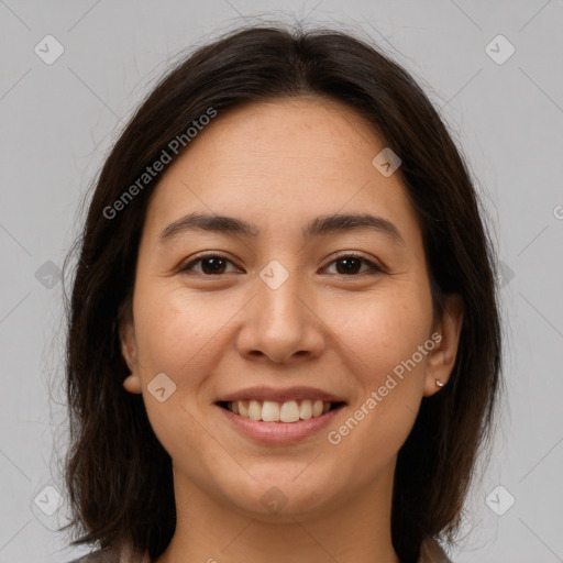 Joyful white young-adult female with medium  brown hair and brown eyes