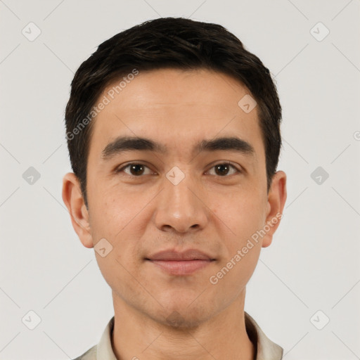 Joyful white young-adult male with short  black hair and brown eyes