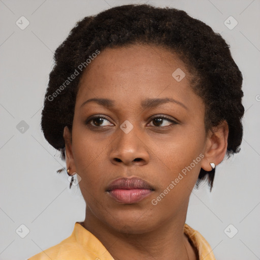 Neutral black young-adult female with short  brown hair and brown eyes