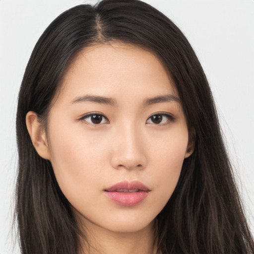 Neutral asian young-adult female with long  brown hair and brown eyes