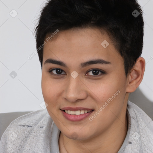Joyful latino young-adult female with short  brown hair and brown eyes