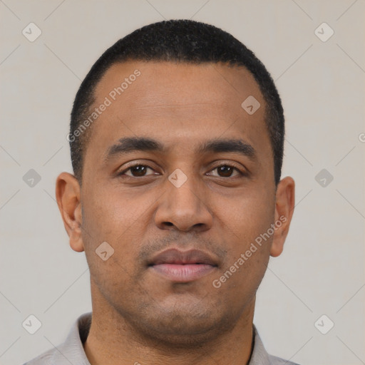 Neutral latino young-adult male with short  black hair and brown eyes