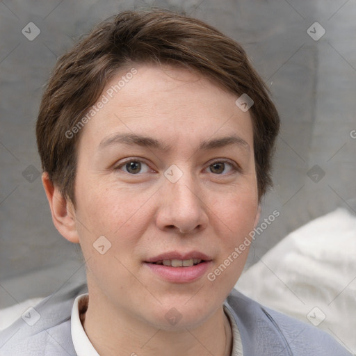 Joyful white young-adult female with short  brown hair and grey eyes