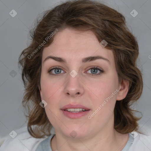 Joyful white young-adult female with medium  brown hair and blue eyes