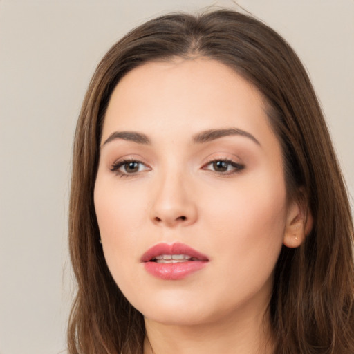 Neutral white young-adult female with long  brown hair and brown eyes