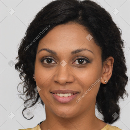 Joyful black young-adult female with medium  brown hair and brown eyes