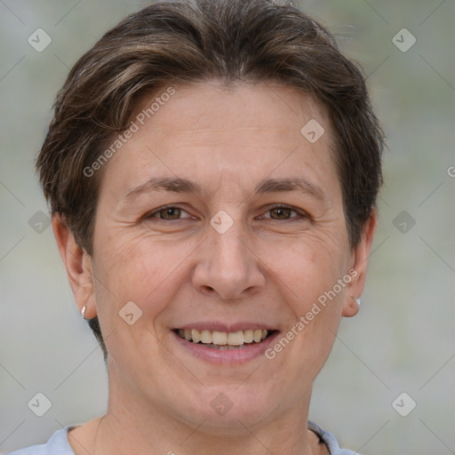 Joyful white adult female with short  brown hair and brown eyes